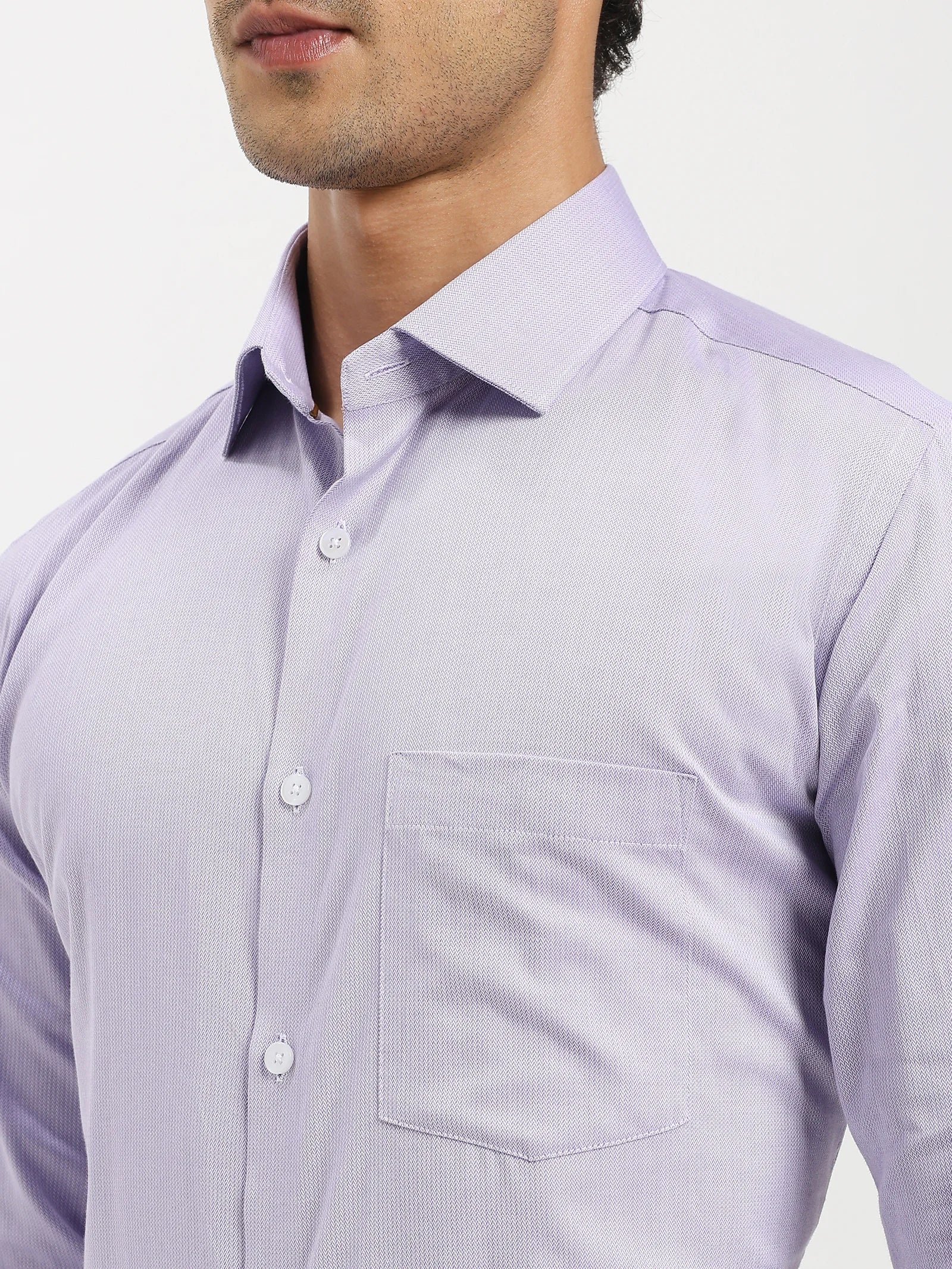 Close-up of Lavender Herringbone Elegance Shirt showcasing refined collar and cuffs